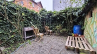 Gemeinschaftsbereich Innenhof - Zweiraumwohnung mit Flair